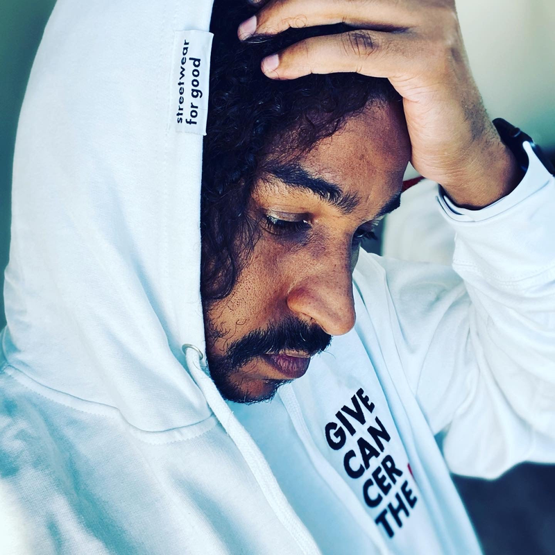 The Word Cancel Cancer designed to look like ink dripping from words.